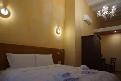 Letto o letti in una camera di PALAZZO FULGHER