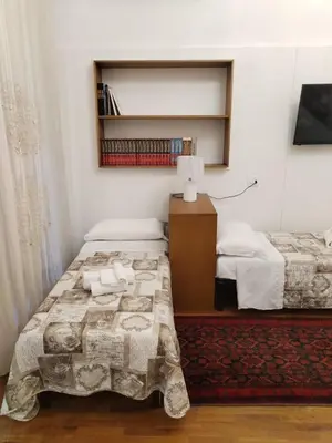 Letto o letti in una camera di PALAZZO FULGHER