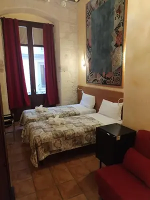Letto o letti in una camera di PALAZZO FULGHER