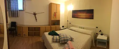 Letto o letti in una camera di DaCapo Rooms