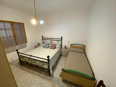 Letto o letti in una camera di CASA SANT'ANNA