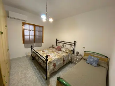 Letto o letti in una camera di CASA SANT'ANNA