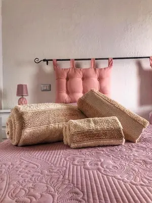 Letto o letti in una camera di BnB Le Janas