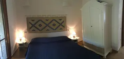 Letto o letti in una camera di Villa Dante