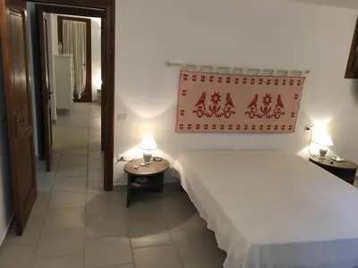 Letto o letti in una camera di Villa Dante