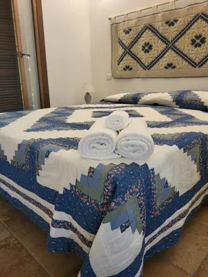 Letto o letti in una camera di Villa Dante