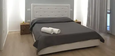Letto o letti in una camera di Space Apartment