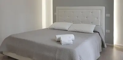 Letto o letti in una camera di Space Apartment