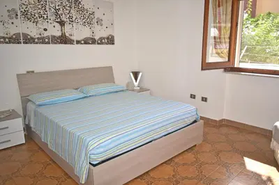 Letto o letti in una camera di Casa Poggio