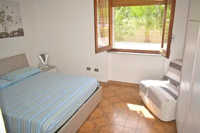 Letto o letti in una camera di Casa Poggio