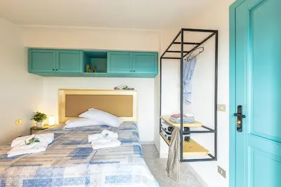 Letto o letti in una camera di Casa Cala Luna