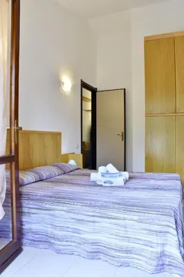 Letto o letti in una camera di Bilo Blu Holiday a 80 metri dal mare