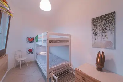 Letto o letti in una camera di Casa Fiore
