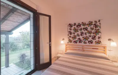Letto o letti in una camera di Casa Fiore