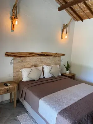 Letto o letti in una camera di Acquamaris Tuerredda
