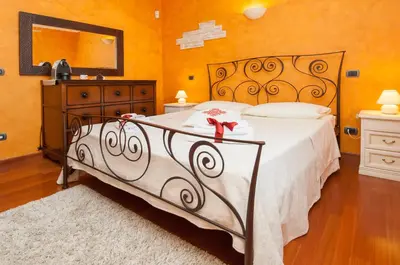 Letto o letti in una camera di B&B La Dolce Vita
