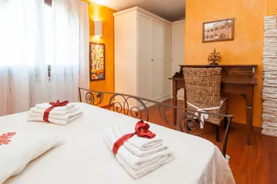 Letto o letti in una camera di B&B La Dolce Vita