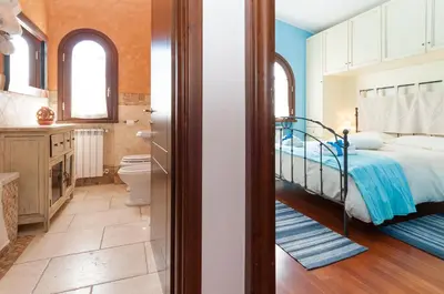 Letto o letti in una camera di B&B La Dolce Vita