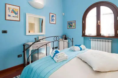 Letto o letti in una camera di B&B La Dolce Vita