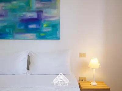 Letto o letti in una camera di Residenza Bougainvillea - MORADA