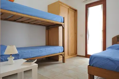 Letto o letti in una camera di Spacious Apartment in Santa Maria Navarrese