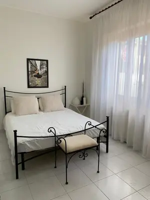 Letto o letti in una camera di Casa Ohana