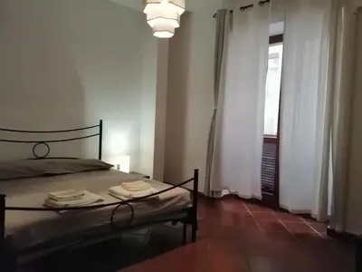 Letto o letti in una camera di Casa Diego