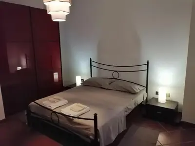 Letto o letti in una camera di Casa Diego