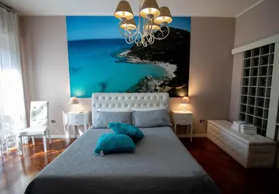 Letto o letti in una camera di La Casa di Adele Cagliari B&B