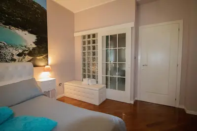 Letto o letti in una camera di La Casa di Adele Cagliari B&B
