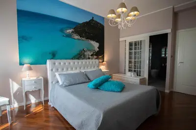 Letto o letti in una camera di La Casa di Adele Cagliari B&B