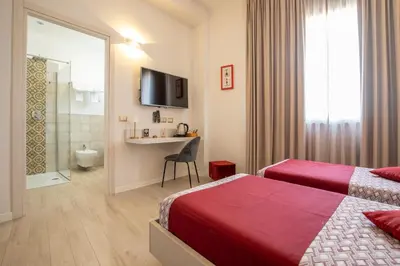 Letto o letti in una camera di La Locanda d'Oro