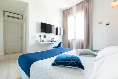 Letto o letti in una camera di La Locanda d'Oro