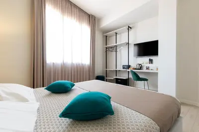 Letto o letti in una camera di La Locanda d'Oro