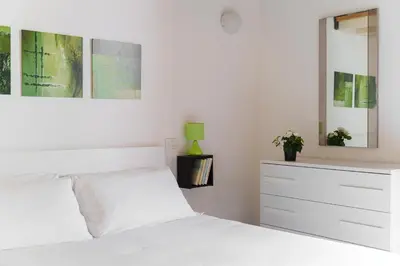Letto o letti in una camera di Sunplace Marina