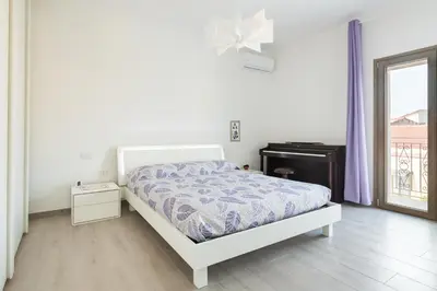 Letto o letti in una camera di Casa Cla Design Home