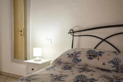Letto o letti in una camera di Entu e Mari - Grecu