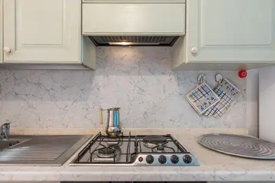 Cucina o angolo cottura di Pearl Coast Apartment