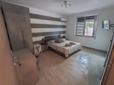 Letto o letti in una camera di Bed&Breakfast Villa Nora