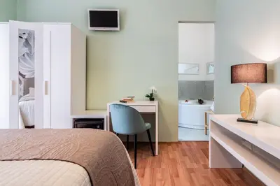 Letto o letti in una camera di Fior Di Loto Rooms