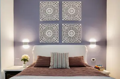 Letto o letti in una camera di Fior Di Loto Rooms