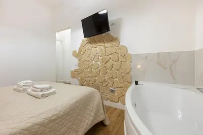 TV o dispositivi per l'intrattenimento presso Fior Di Loto Rooms