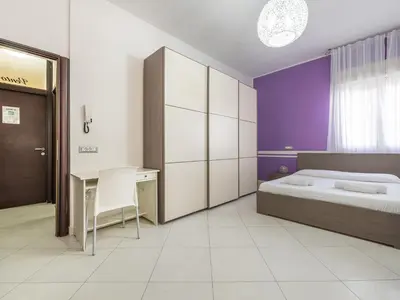 Letto o letti in una camera di Thanit Rooms