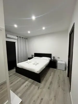 Letto o letti in una camera di Thanit Rooms