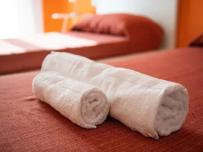 Letto o letti in una camera di Thanit Rooms