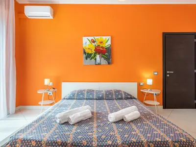 Letto o letti in una camera di Thanit Rooms