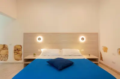 Letto o letti in una camera di Bardilio Luxury Rooms