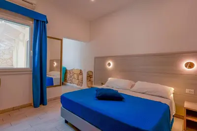 Letto o letti in una camera di Bardilio Luxury Rooms