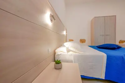 Letto o letti in una camera di Bardilio Luxury Rooms