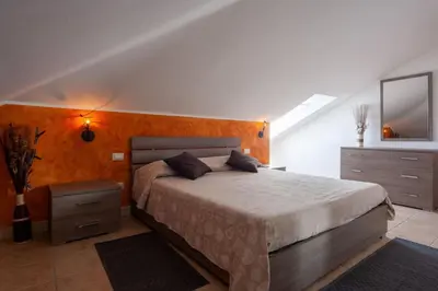 Letto o letti in una camera di Villa Chloe